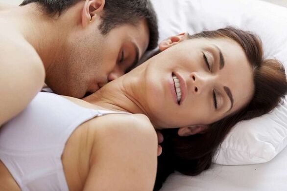 Men and women excited in bed