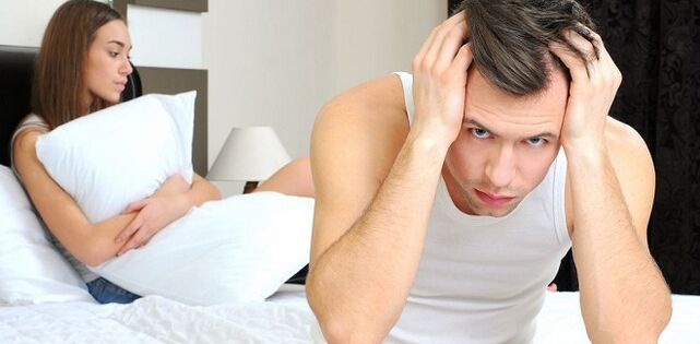 Men and women in bed